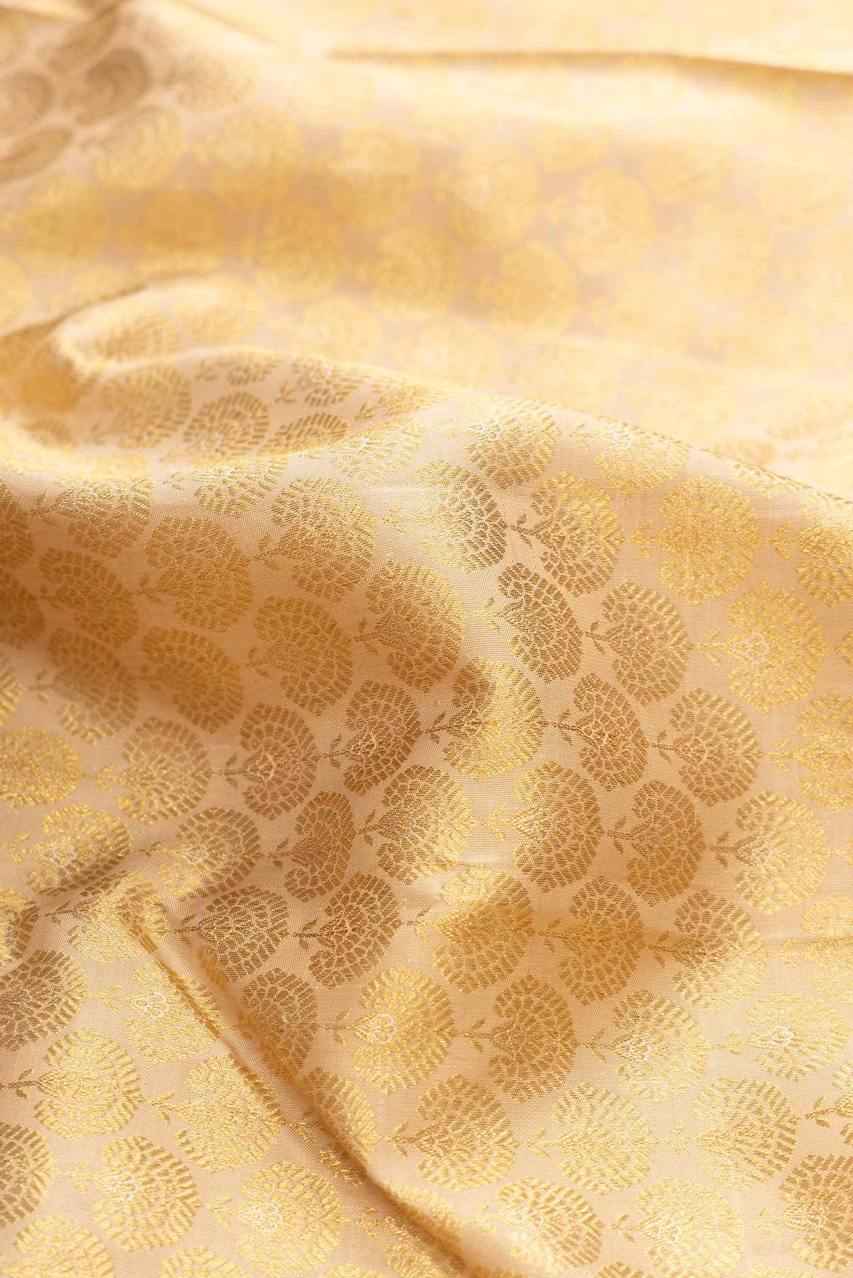 Close up of Sandal Dual Tone Kanchipuram Silk Saree with Zari Brocade on the body and Zari Border displaying folds