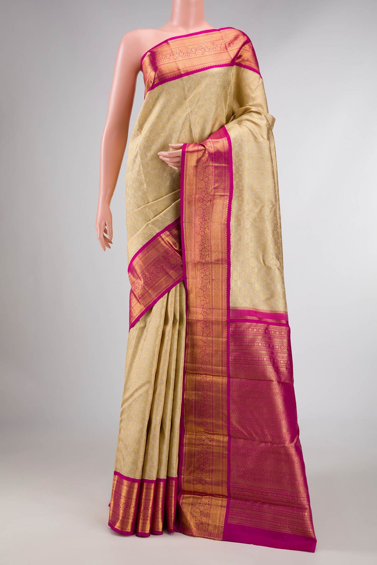 Sandal Dual Tone Kanchipuram Silk Saree with Zari Brocade on the body and Zari Border displayed on a mannequin