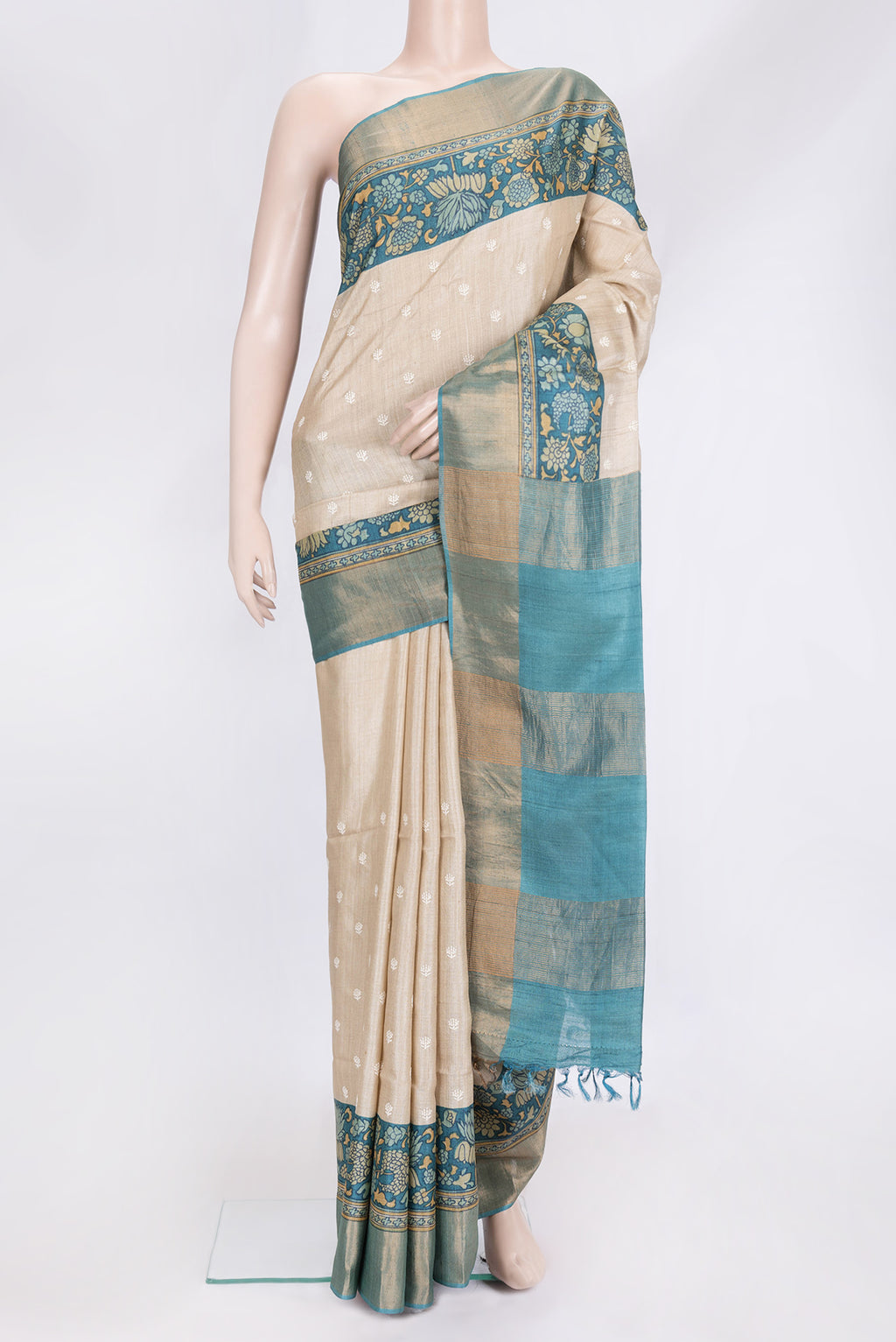 Beige Dual Tone Tussar Silk Saree with Embroidery on the body and Printed Border.  displayed on a mannequin