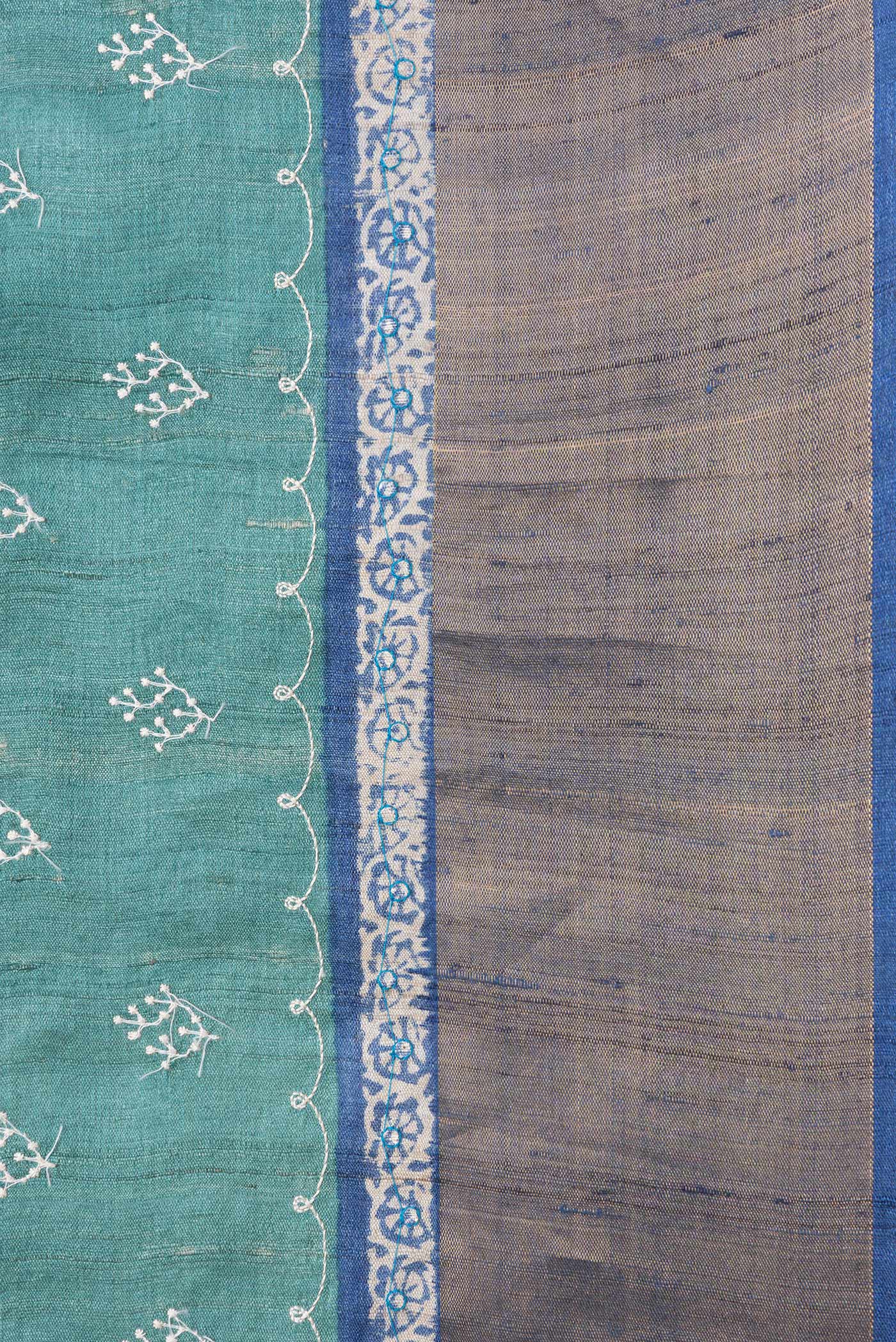 Border image of Green Dual Tone Tussar Silk Saree with Embroidery on the body and Zari Border. 