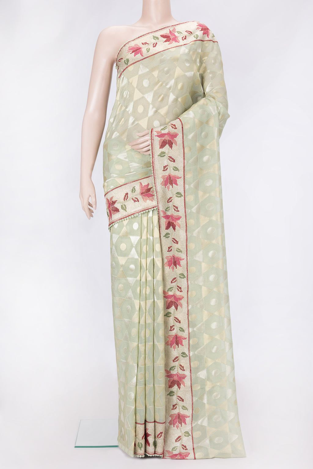 Pista Green Dual Tone Organza Silk Saree with Zari Brocade on the body and Embroidery Border.  displayed on a mannequin