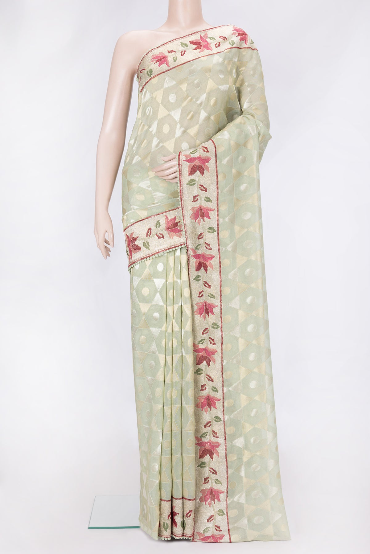 Pista Green Dual Tone Organza Silk Saree with Zari Brocade on the body and Embroidery Border.  displayed on a mannequin