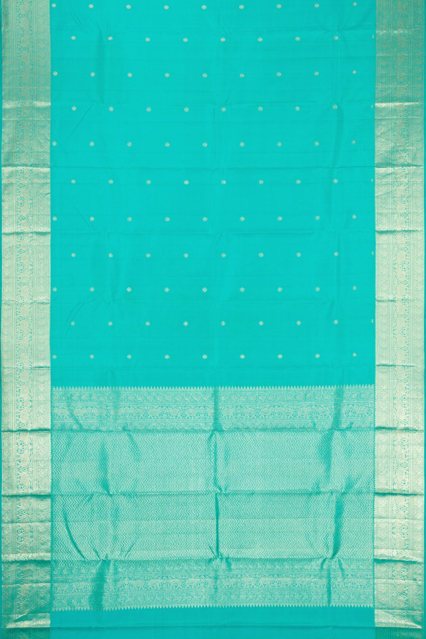 Flat view of Turquoise Kanchipuram Silk Saree with Zari Butta on the body and Zari Border. 