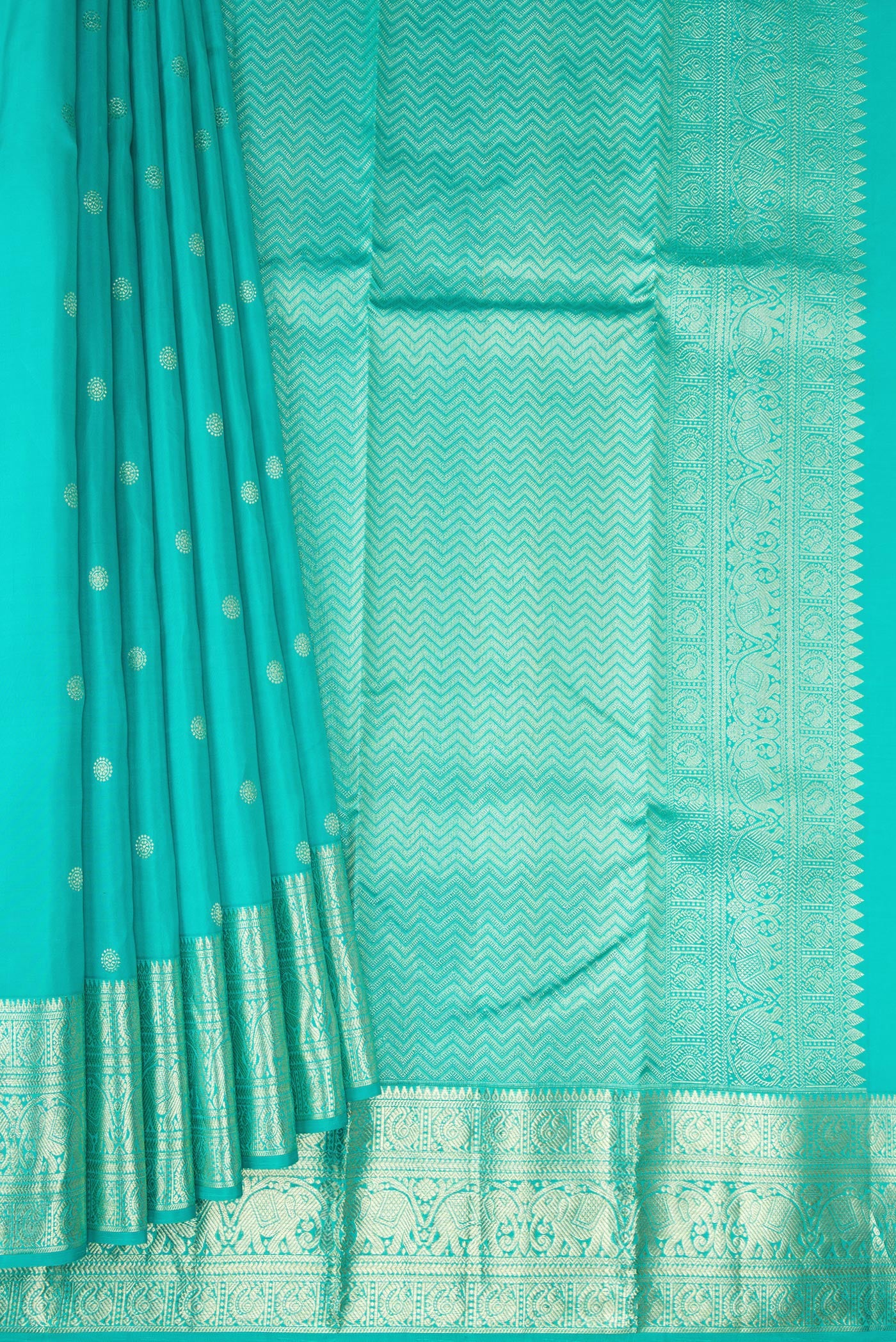 Pleats and pallu of Turquoise Kanchipuram Silk Saree with Zari Butta on the body and Zari Border. 