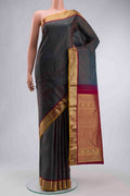 Blue Kanchipuram Silk Saree with Checked design on the body and Zari Border displayed on a mannequin