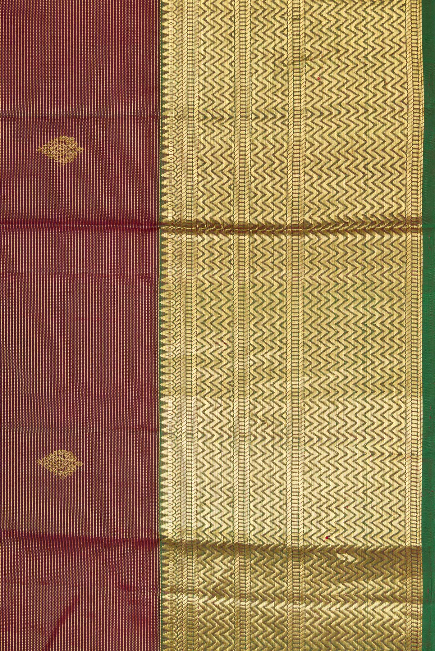 Border image of Brown Dual Tone Kanchipuram Silk Saree with Zari Butta on the body and Zari Border. 