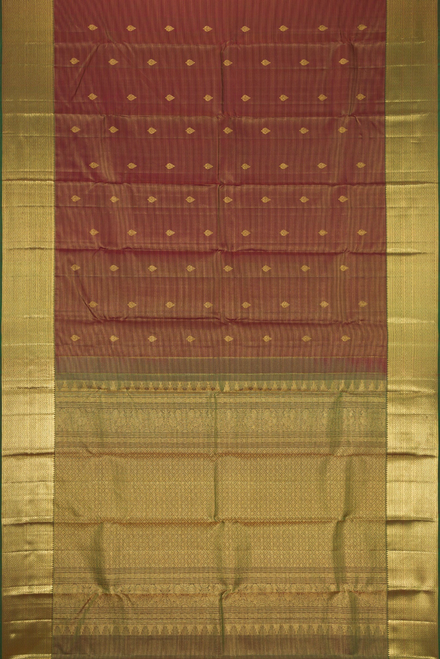 Flat view of Brown Dual Tone Kanchipuram Silk Saree with Zari Butta on the body and Zari Border. 