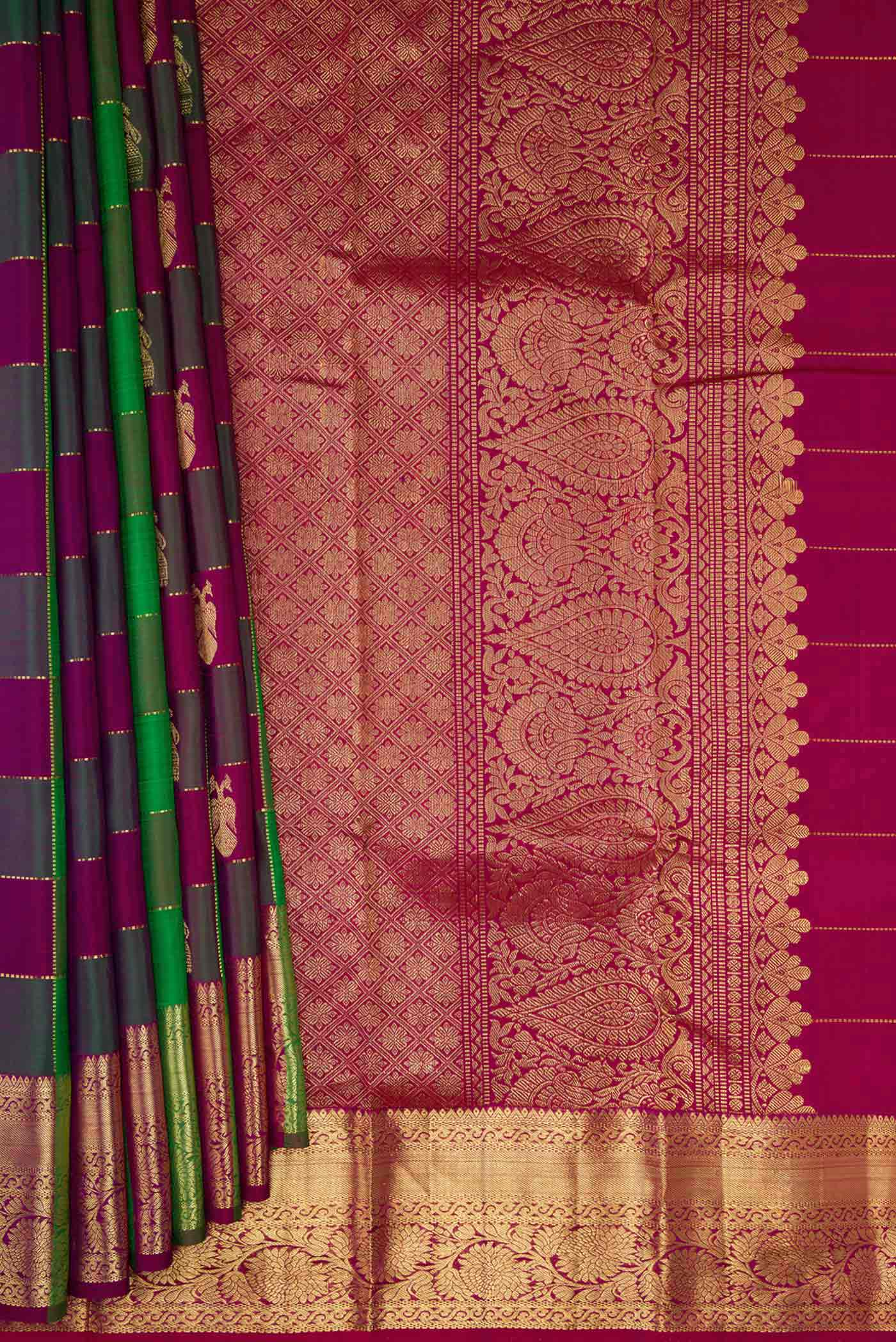 Pleats and pallu of Green and Purple Color Kanchipuram Silk Saree with Checked design on the body and Zari Border