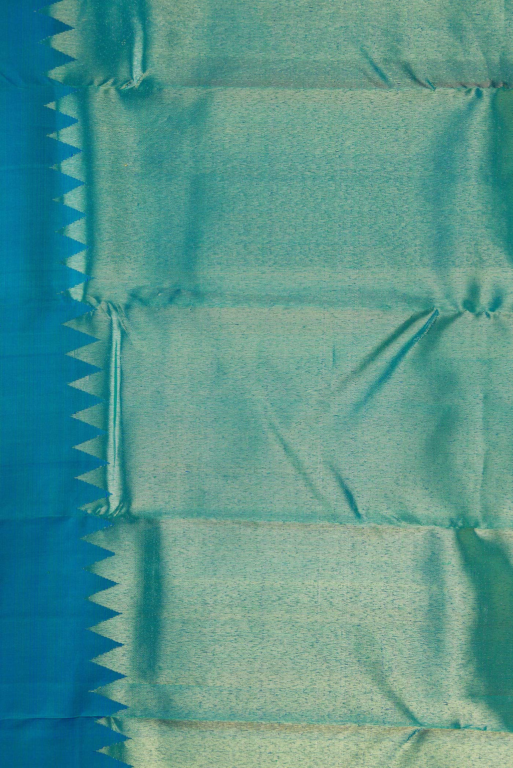 Border image of Peacock Blue Dual Tone Kanjivaram Silk Saree with Plain Body and Rising Temple Border. 