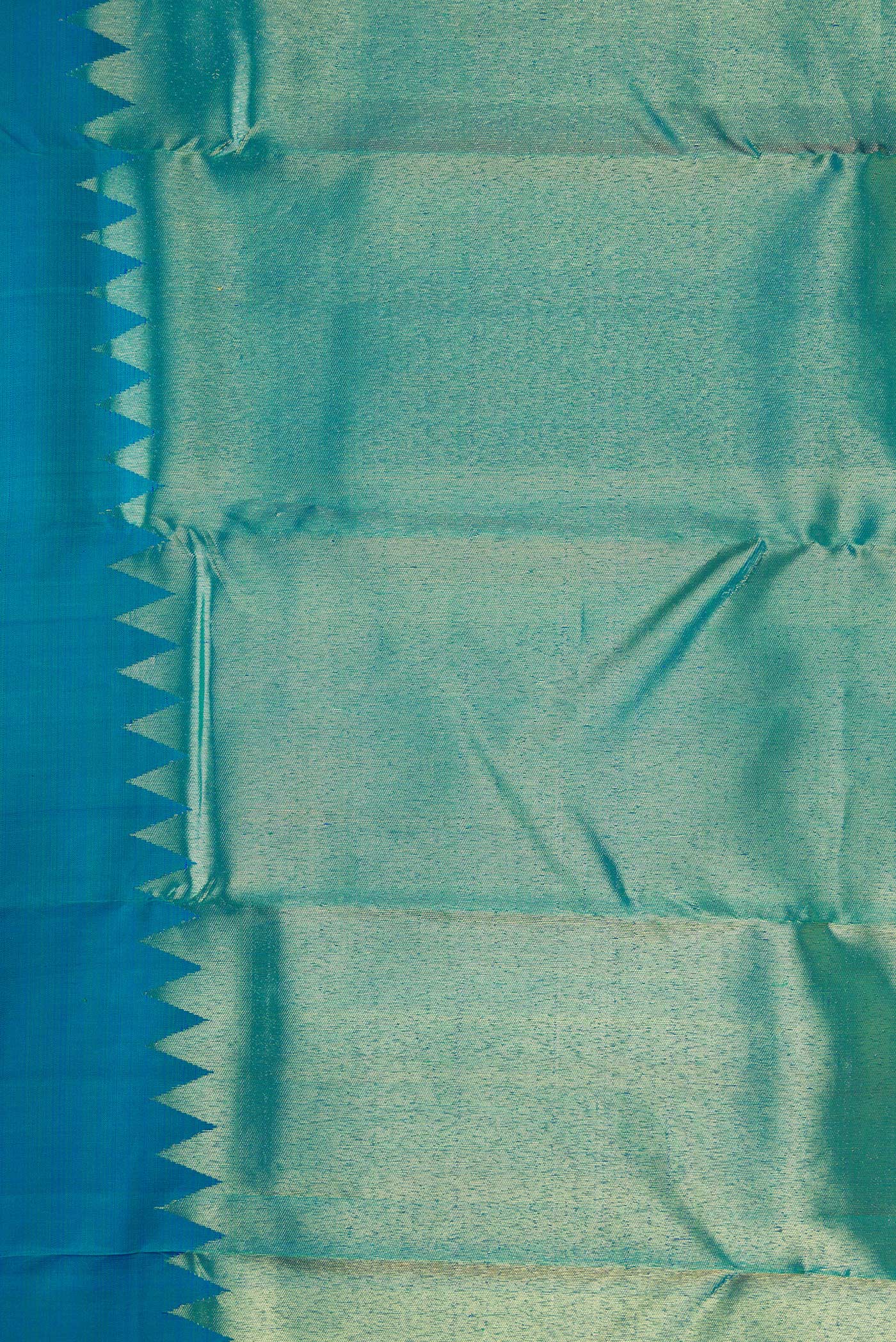 Border image of Peacock Blue Dual Tone Kanjivaram Silk Saree with Plain Body and Rising Temple Border. 