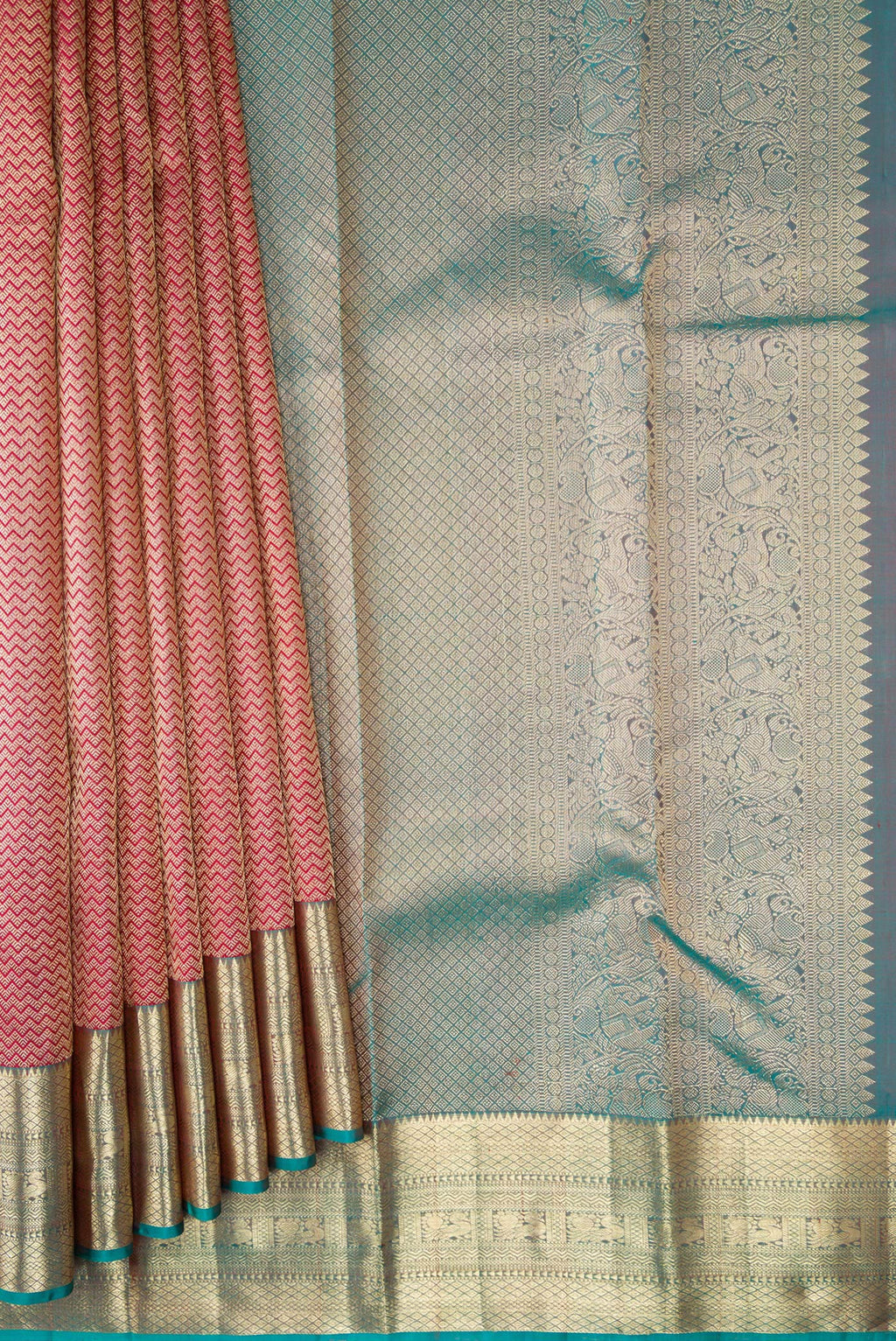 Pleats and pallu of Maroon Kanjivaram Silk Saree with Zari Brocade on the body and Zari Border. 