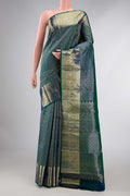 Peacock Blue Dual Tone Kanchipuram Silk Saree with Zari Brocade on the body and Zari Border displayed on a mannequin