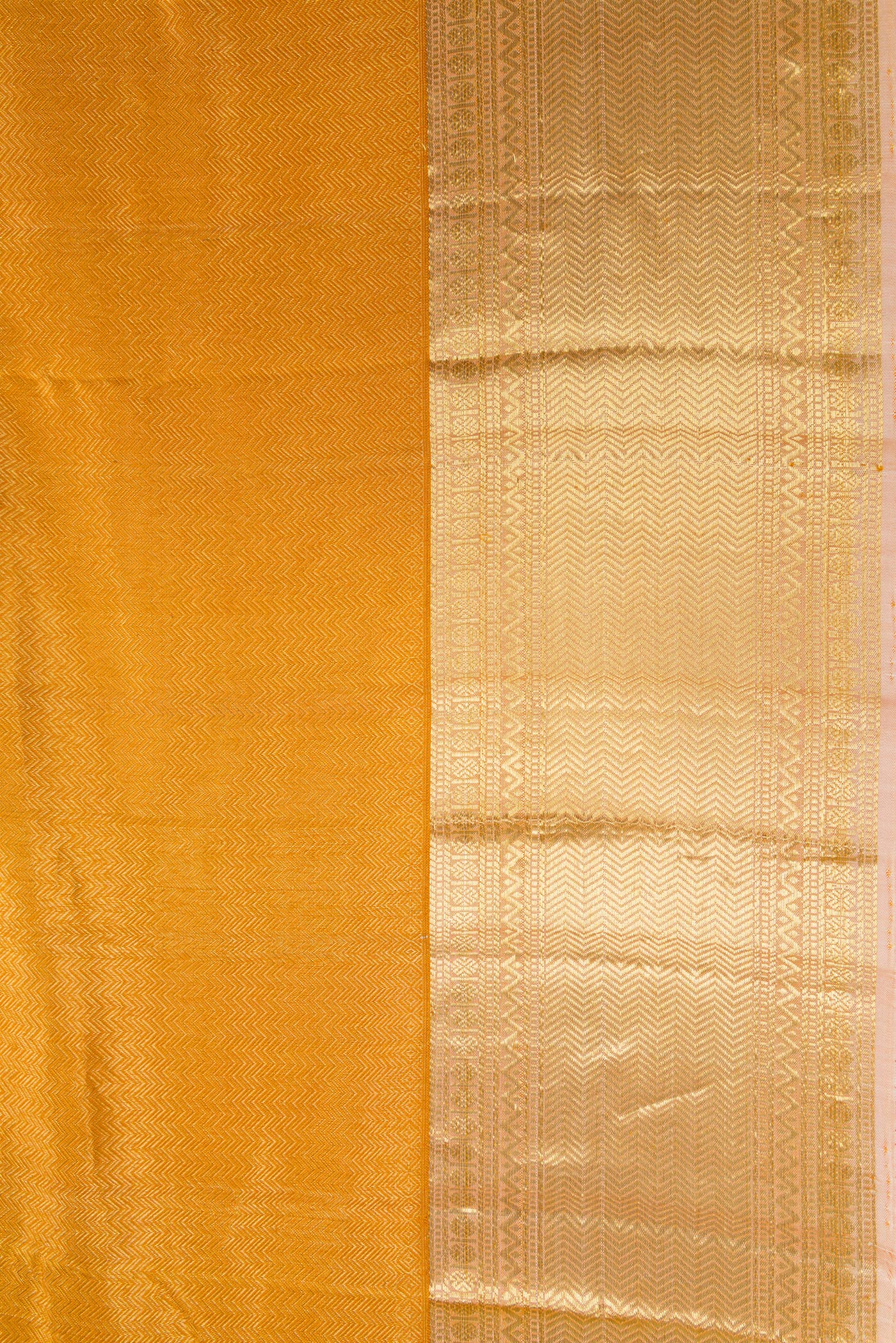 Border image of Gold Dual Tone Kanjivaram Silk Saree with Zari Brocade on the body and Zari Border. 