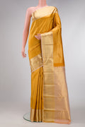 Gold Dual Tone Kanjivaram Silk Saree with Zari Brocade on the body and Zari Border.  displayed on a mannequin