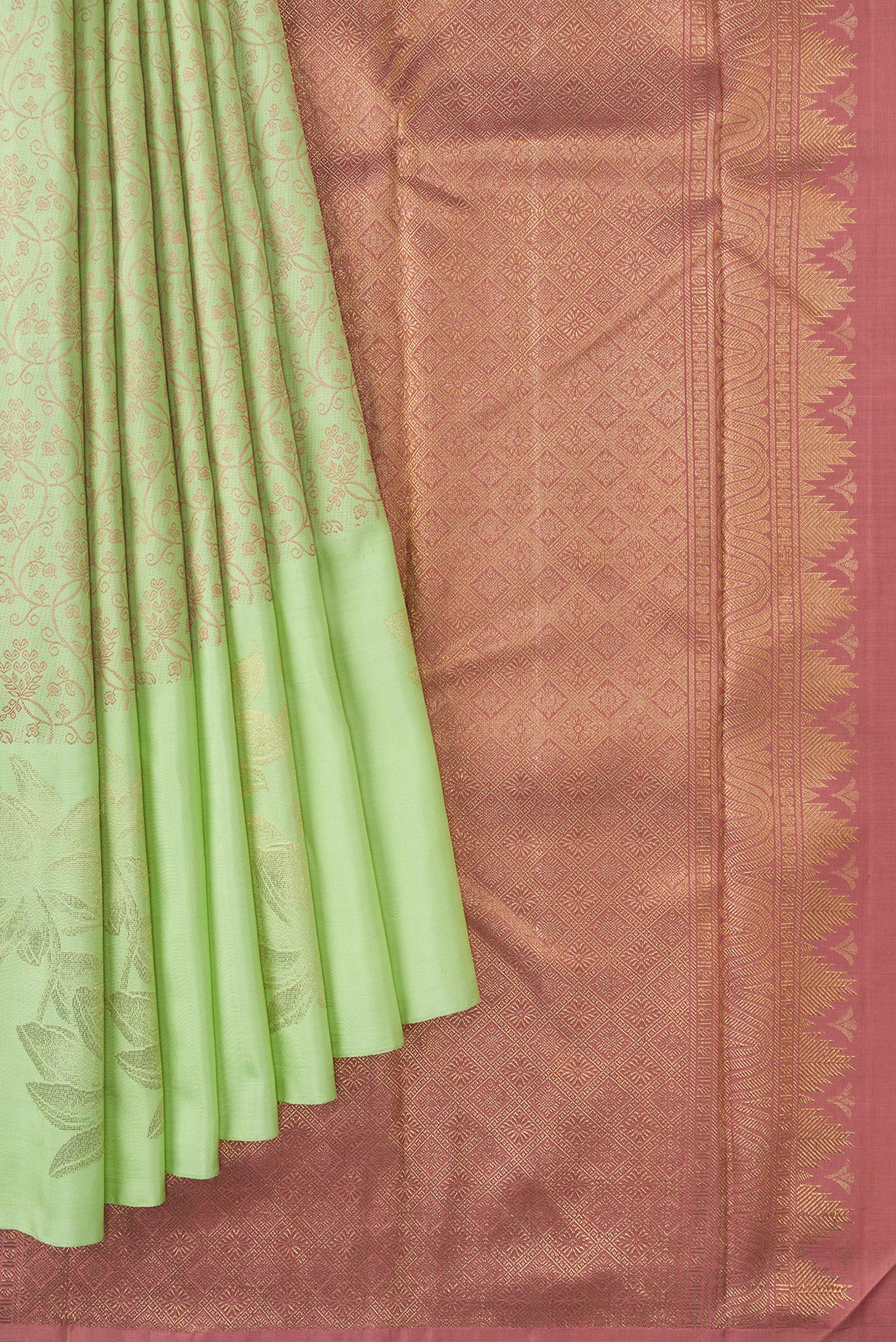 Pleats and pallu of Pure Silk Pure Zari Pista Green Dual Tone Kanchipuram Saree with Jacquard design on the body and Fancy Border. 