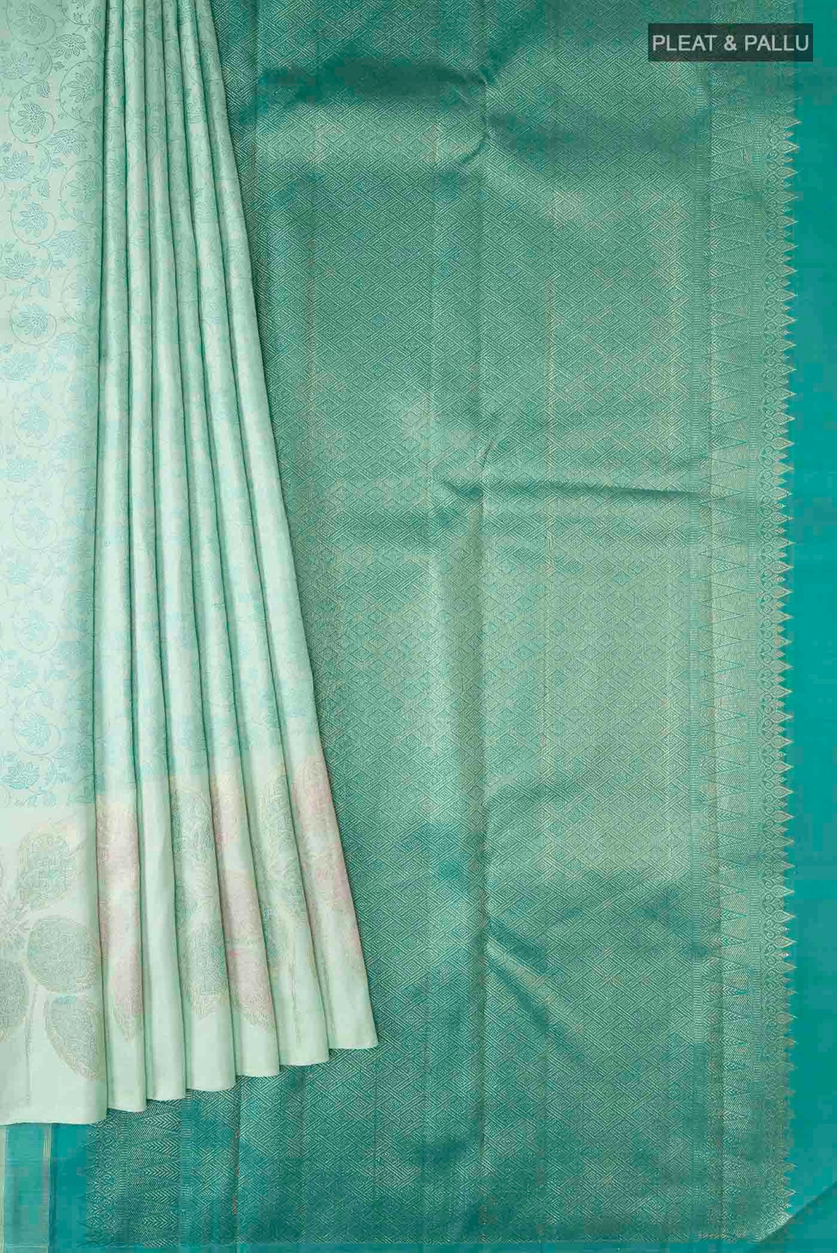 Pleats and pallu of Green Kanchipuram Silk Saree with Jacquard design on the body and Zari Border