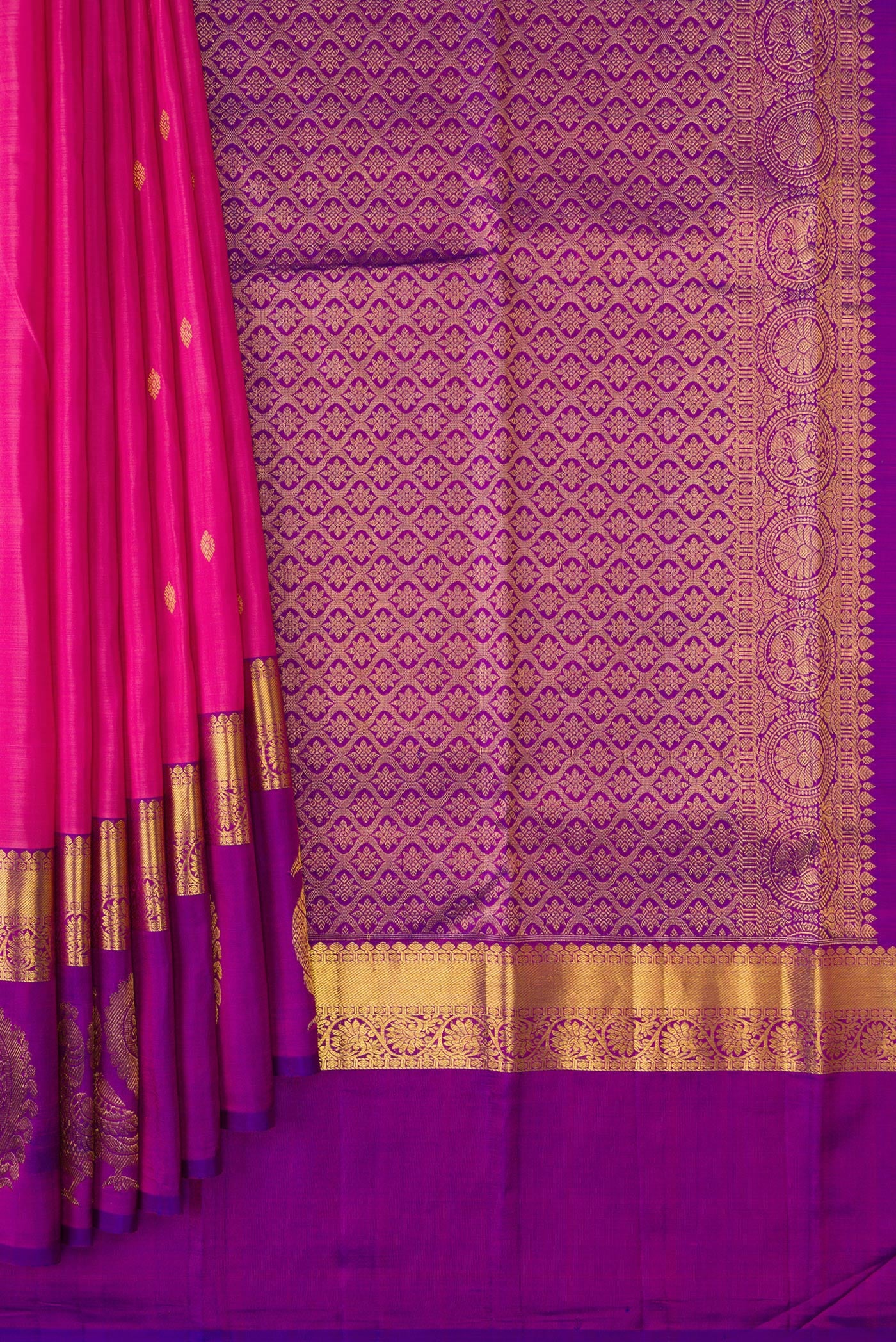 Pleats and pallu of Pink Dual Tone Kanchipuram Silk Saree with Zari Butta on the body and Fancy Border. 