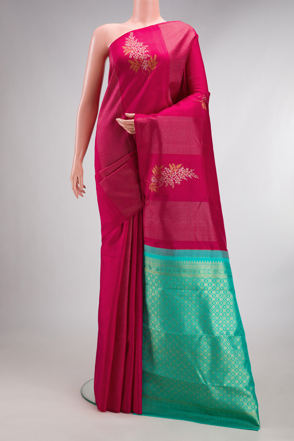 Pure Silk Dark Pink Dual Tone Kanjivaram Saree with Zari Butta on the body and Without Border.  displayed on a mannequin