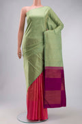 Green Kanchipuram Silk Saree with Stripes on the body and Without Border displayed on a mannequin