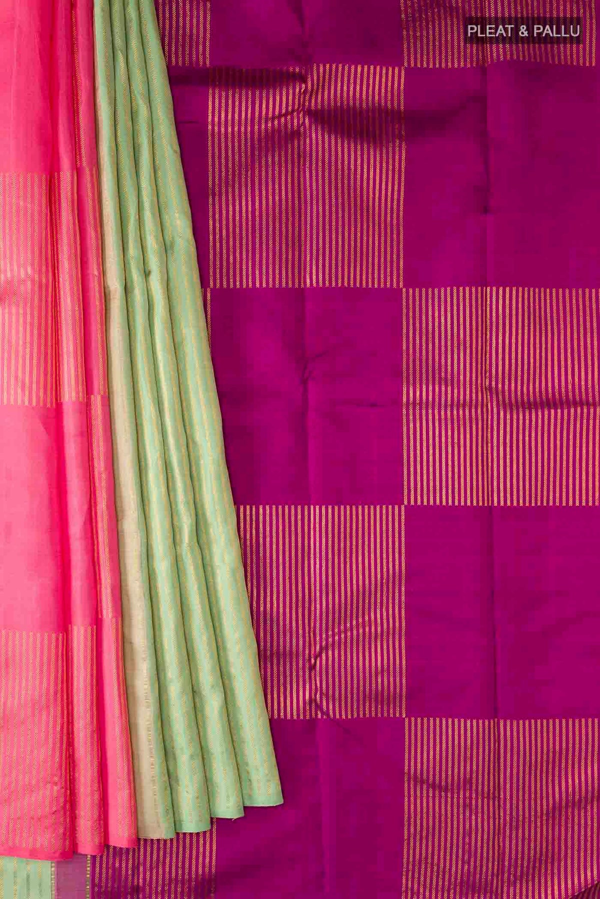 Pleats and pallu of Green Kanchipuram Silk Saree with Stripes on the body and Without Border