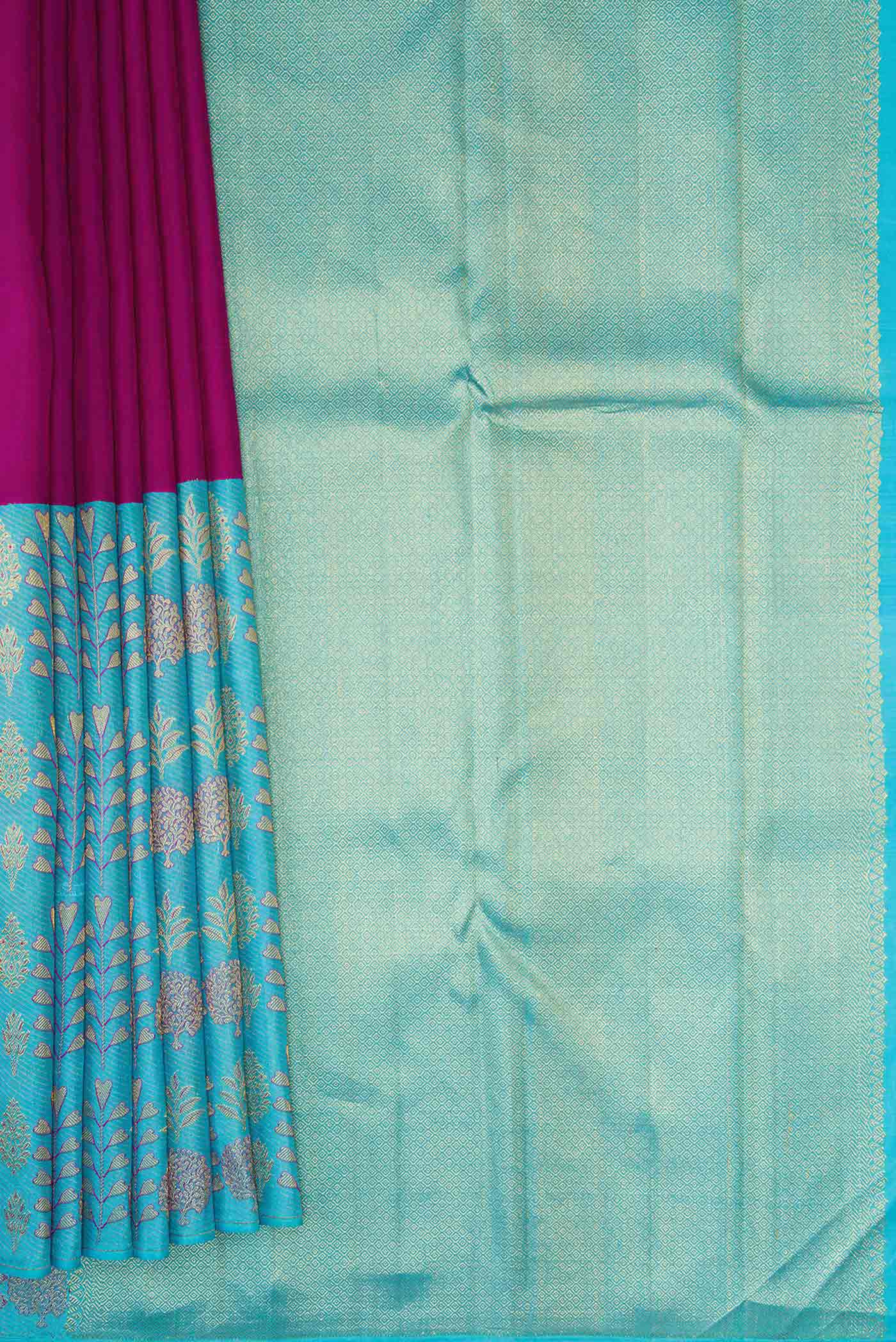 Pleats and pallu of Magenta Dual Tone Kanchipuram Silk Saree with Plain Body and Fancy Border