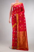 Pure Silk Pure Zari Red Dual Tone Kanchipuram Saree with Jacquard With Zari Butta on the body and Zari Border.  displayed on a mannequin
