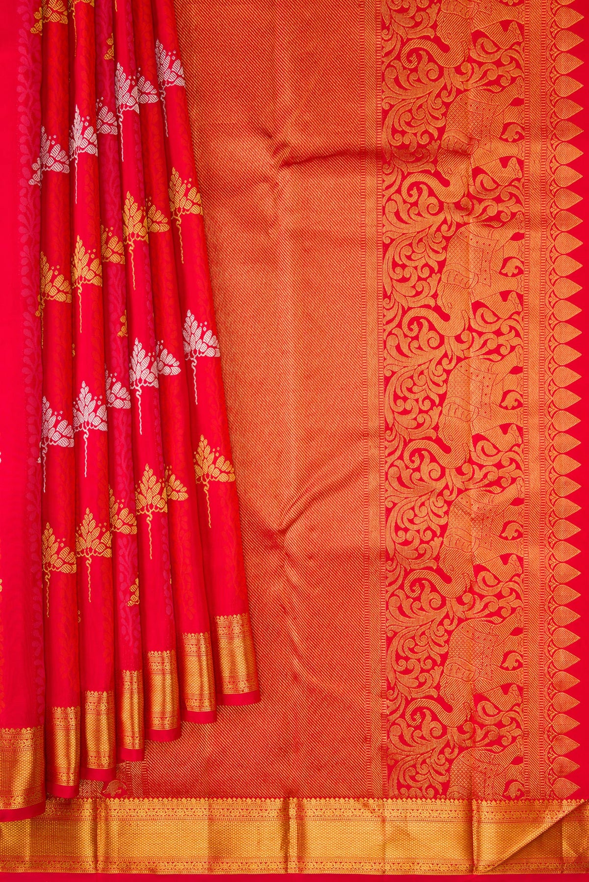 Pleats and pallu of Pure Silk Pure Zari Red Dual Tone Kanchipuram Saree with Jacquard With Zari Butta on the body and Zari Border. 