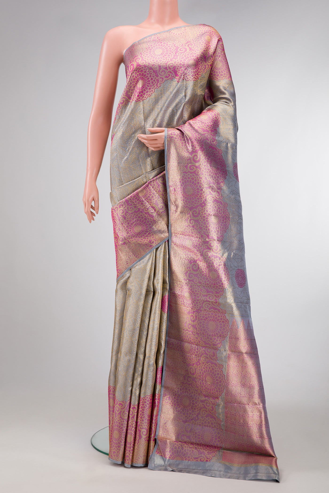 Grey Dual Tone Kanchipuram Tissue Silk Saree with Zari Brocade on the body and Fancy Border.  displayed on a mannequin
