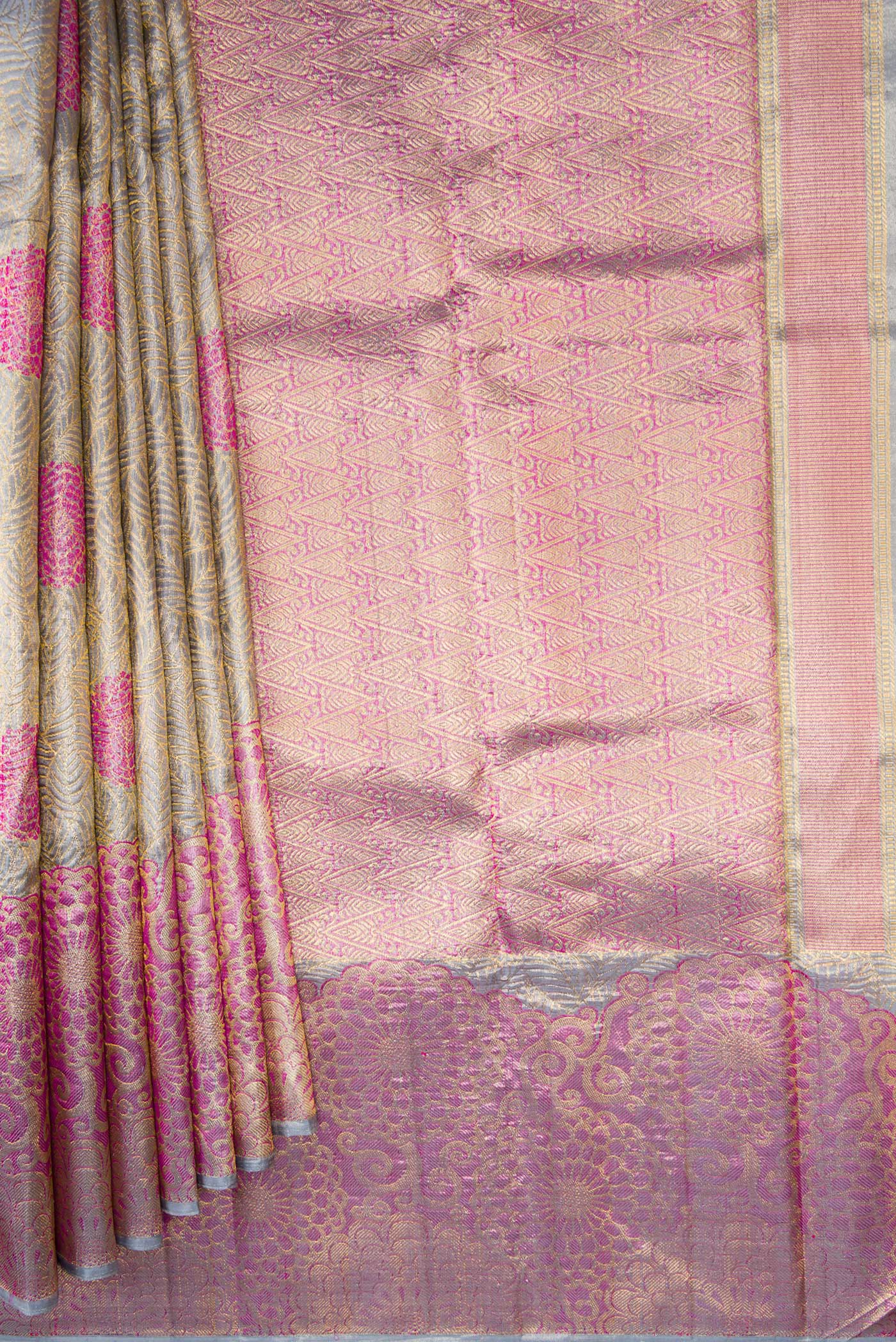 Pleats and pallu of Grey Dual Tone Kanchipuram Tissue Silk Saree with Zari Brocade on the body and Fancy Border. 