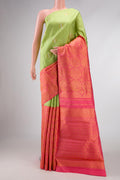 Pista Green and pink Color Kanchipuram Silk Saree with Half And Half on the body and Without Border displayed on a mannequin