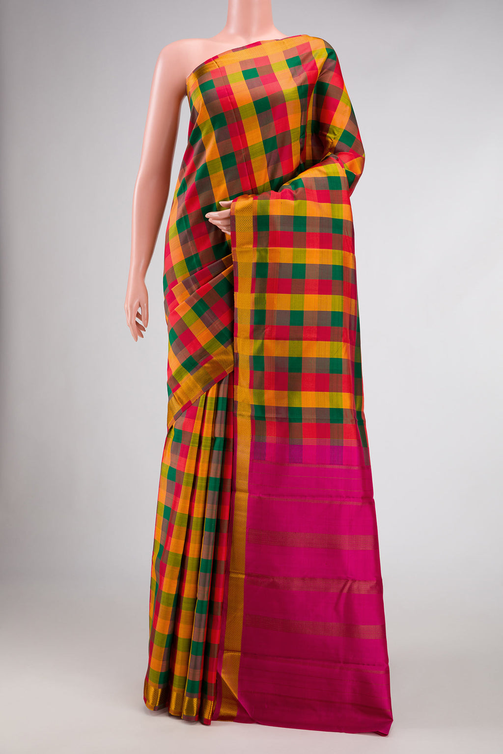 Red, Green and Orange Color Kanchipuram Silk Saree with Checked design on the body and Thread Border.  displayed on a mannequin