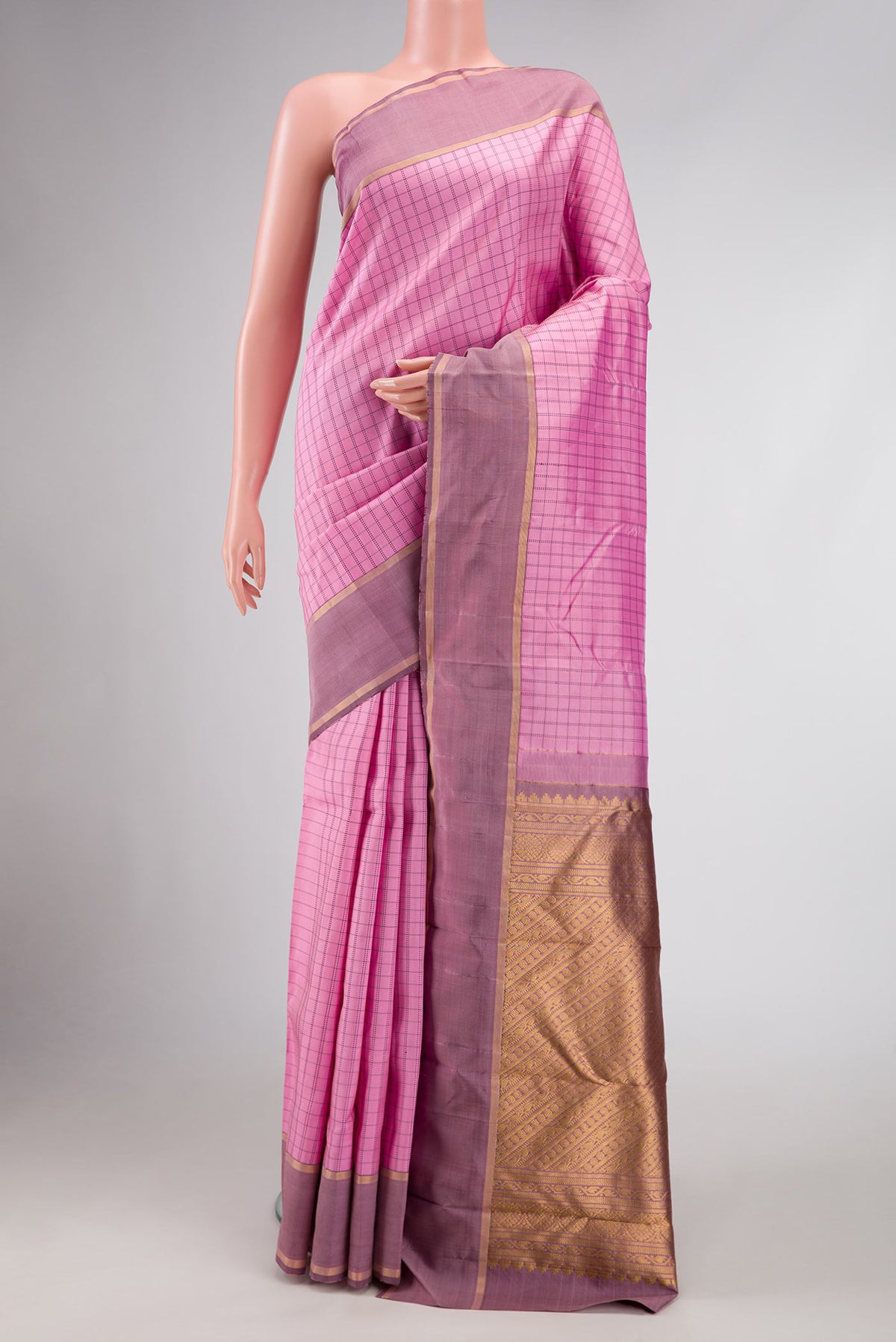 Pure Silk Pure Zari Pink Dual Tone Kanchipuram Saree with Checked design on the body and Zari Border.  displayed on a mannequin