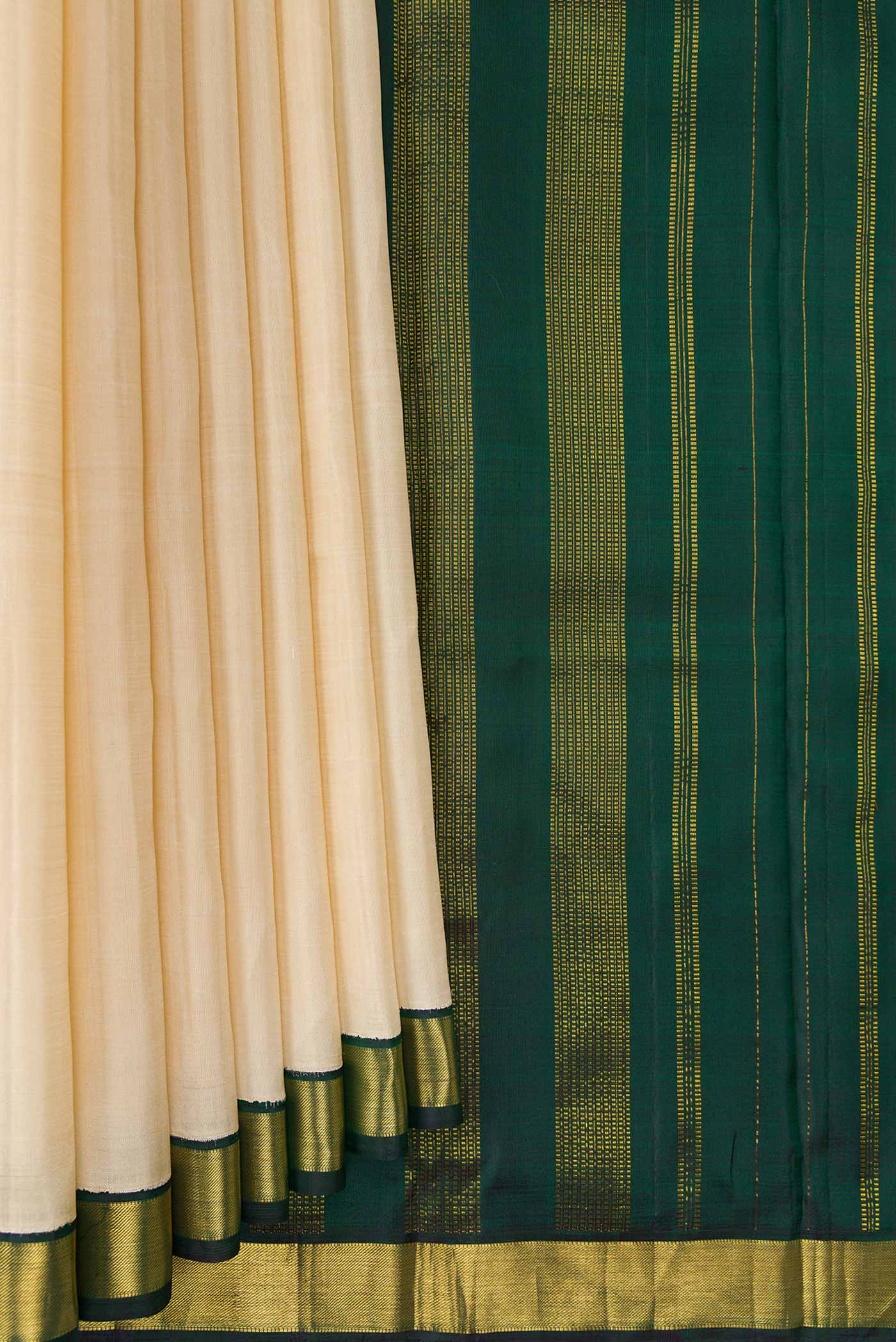 Pleats and pallu of Sandal Dual Tone Kanjivaram Silk Saree with Plain Body and Zari Border. 