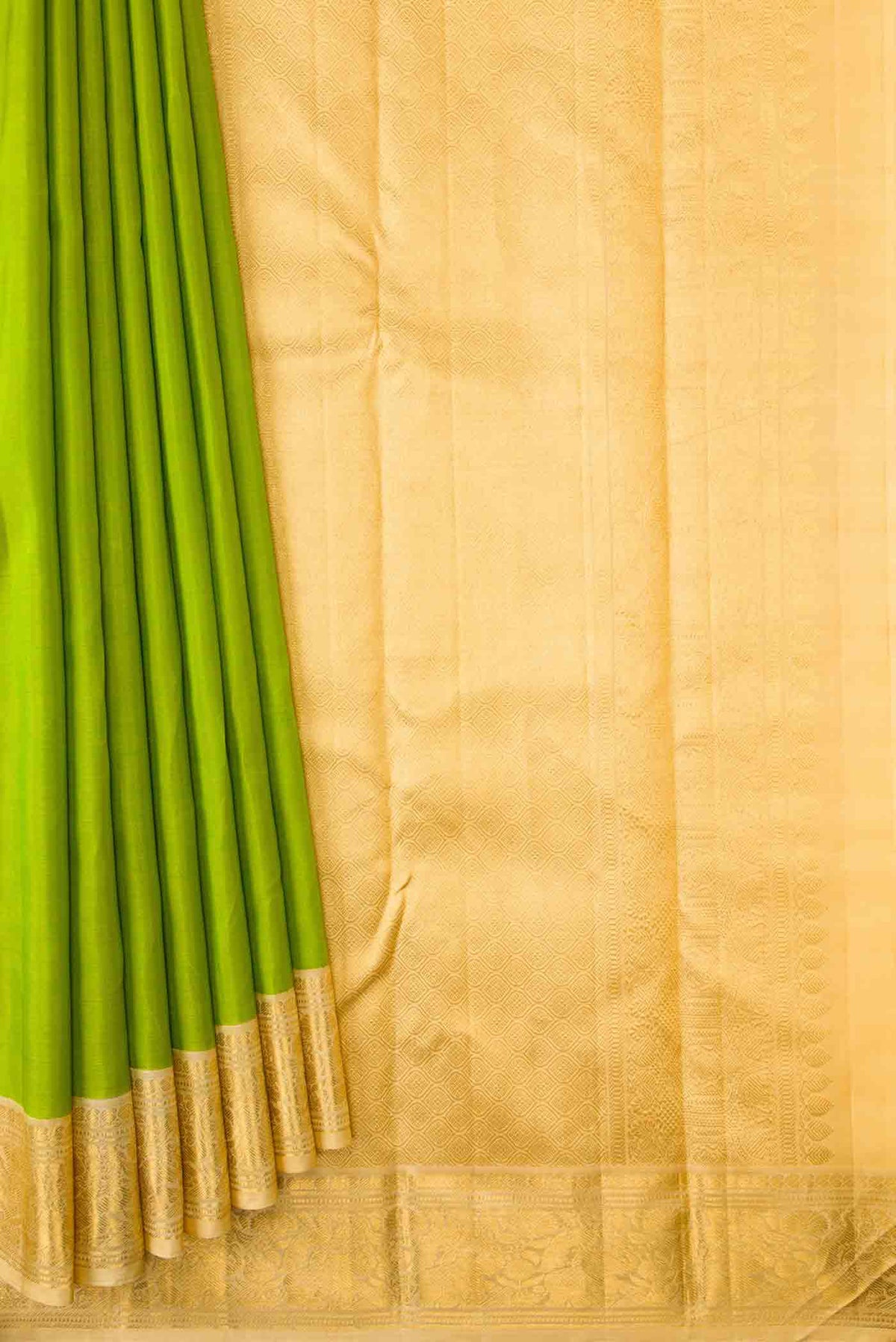 Pleats and pallu of Parrot Green Dual Tone Kanchipuram Silk Saree with Plain Body and Zari Border