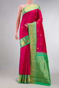 Pink Dual Tone Kanjivaram Silk Saree with Zari Butta on the body and Zari Border.  displayed on a mannequin