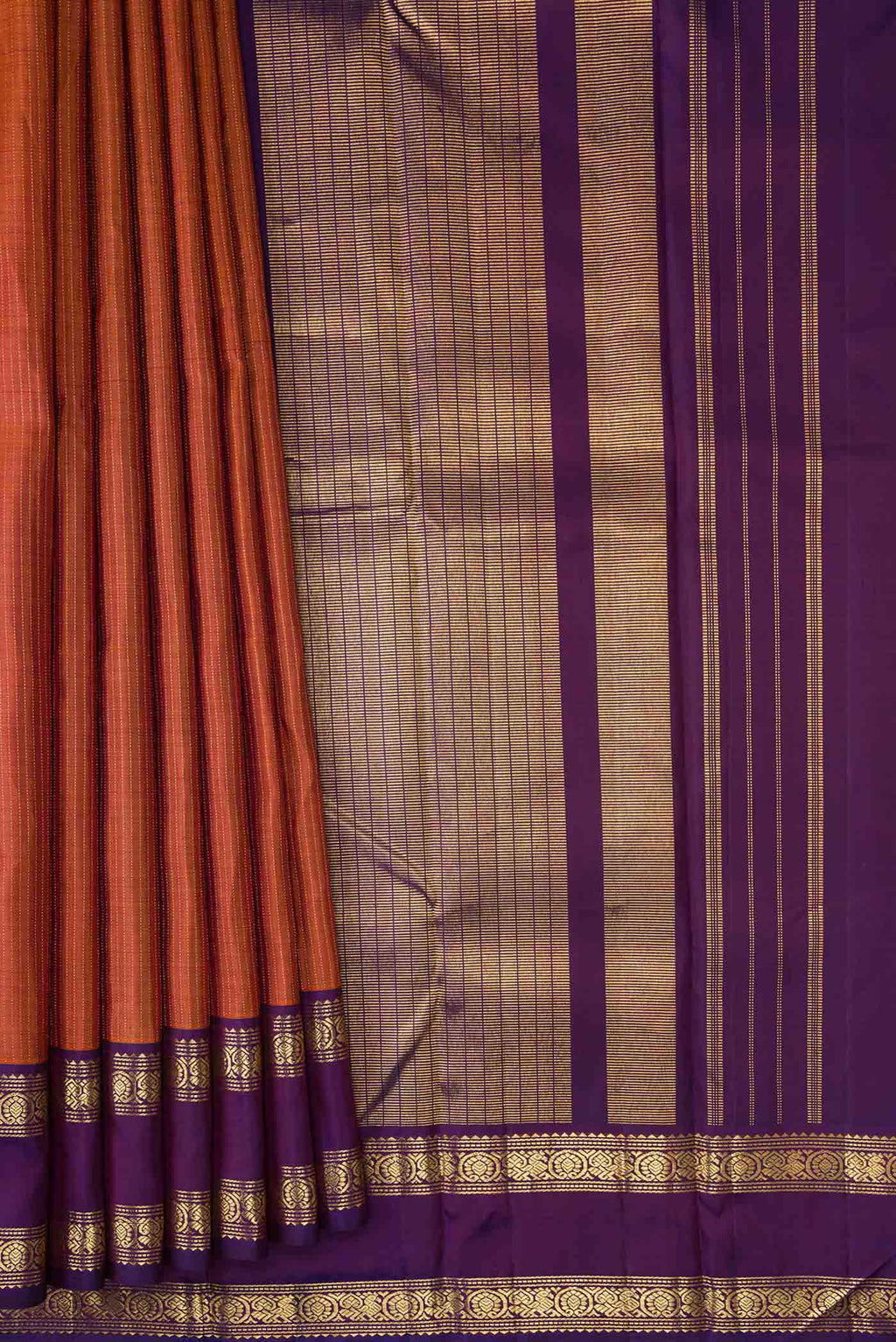 Pleats and pallu of Brick Orange Dual Tone Kanchipuram Silk Saree with Stripes on the body and Zari Border