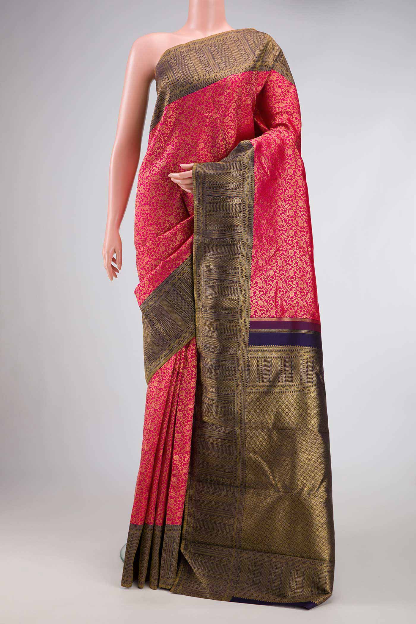 Pink Dual Tone Kanchipuram Silk Saree with Zari Brocade on the body and Zari Border.  displayed on a mannequin