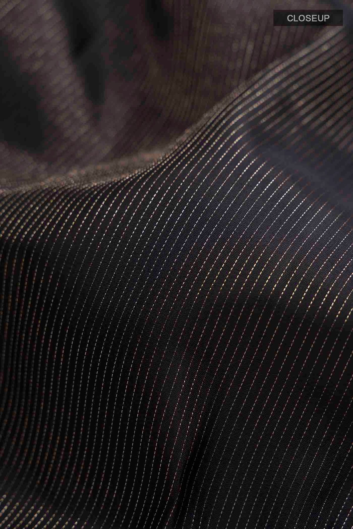 Close up of Black Kanchipuram Silk Saree with Stripes on the body and Without Border displaying folds