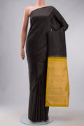 Black Kanchipuram Silk Saree with Stripes on the body and Without Border displayed on a mannequin