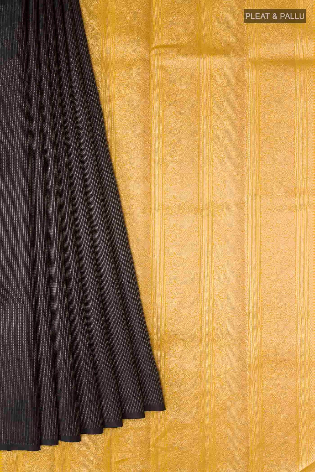 Pleats and pallu of Black Kanchipuram Silk Saree with Stripes on the body and Without Border