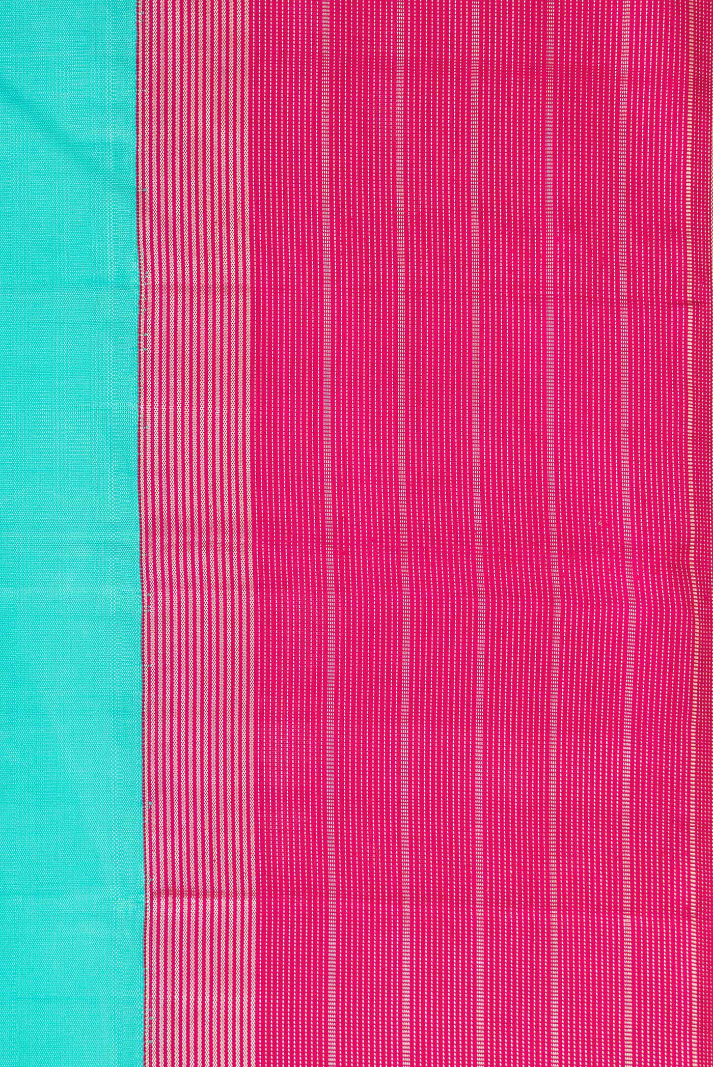 Border image of Sea Green Dual Tone Kanjivaram Silk Saree with Plain Body and Zari Border. 