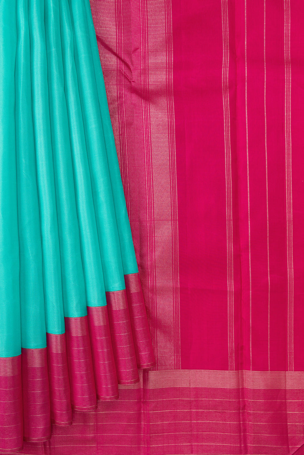 Pleats and pallu of Sea Green Dual Tone Kanjivaram Silk Saree with Plain Body and Zari Border. 
