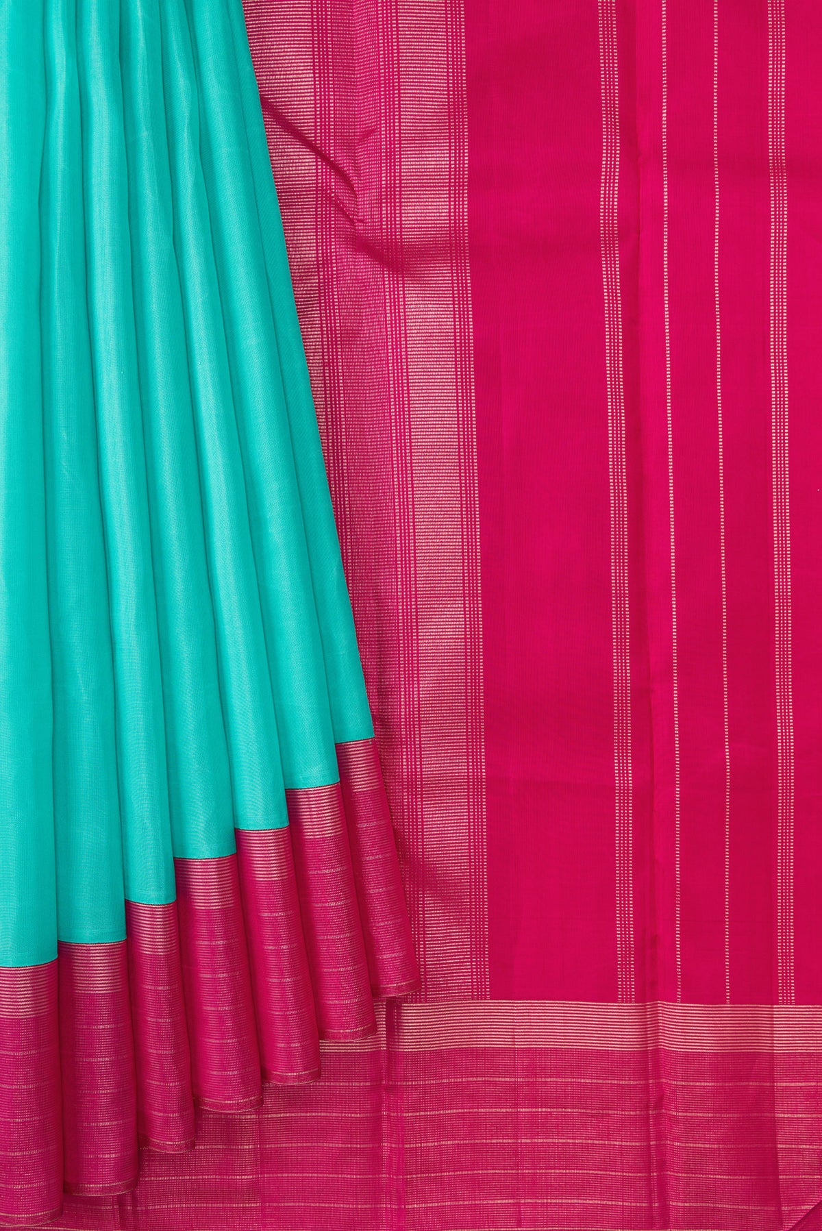 Pleats and pallu of Sea Green Dual Tone Kanjivaram Silk Saree with Plain Body and Zari Border. 