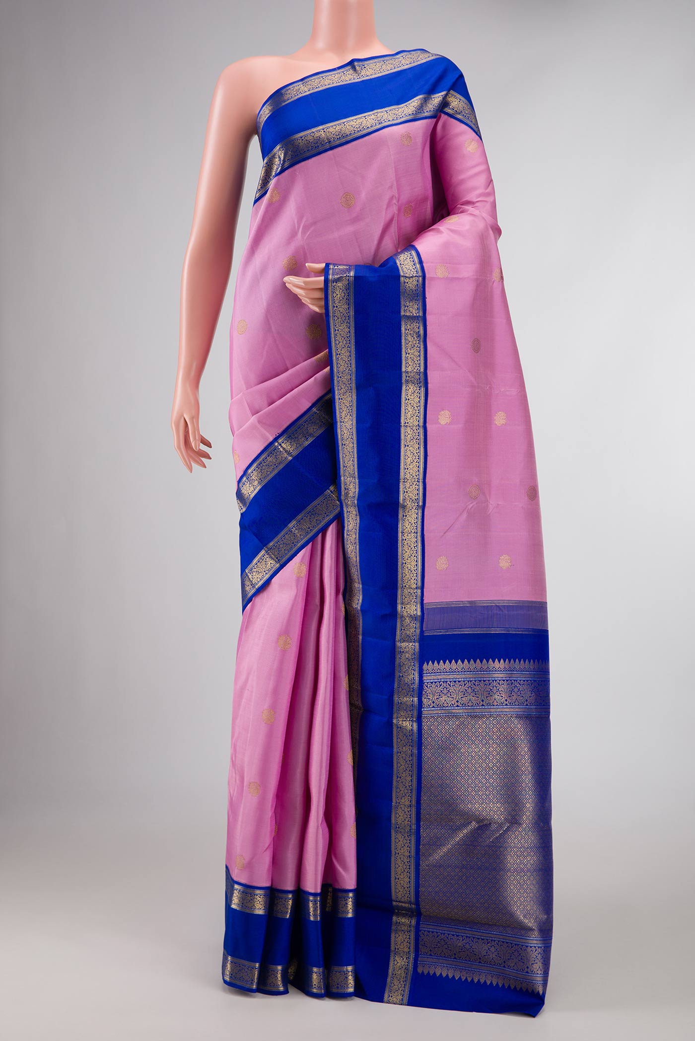 Pure Silk Pure Zari Lilac Dual Tone Kanchipuram Saree with Zari Butta on the body and Zari Border displayed on a mannequin