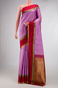 Pure Silk Pure Zari Lavender Dual Tone Kanchipuram Saree with Thread Butta on the body and Zari Border displayed on a mannequin