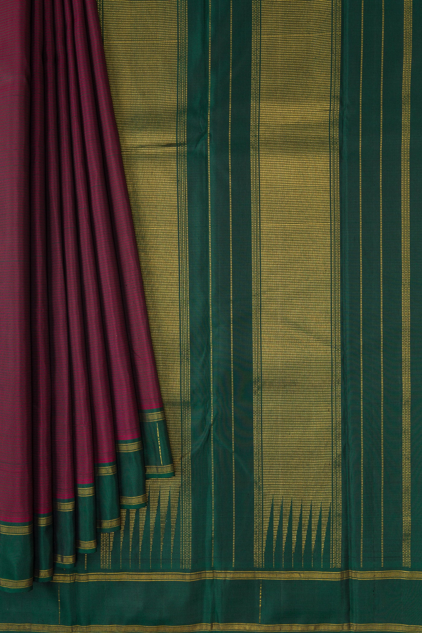 Pleats and pallu of Maroon Dual Tone Kanchipuram Silk Saree with Stripes on the body and Zari Border. 