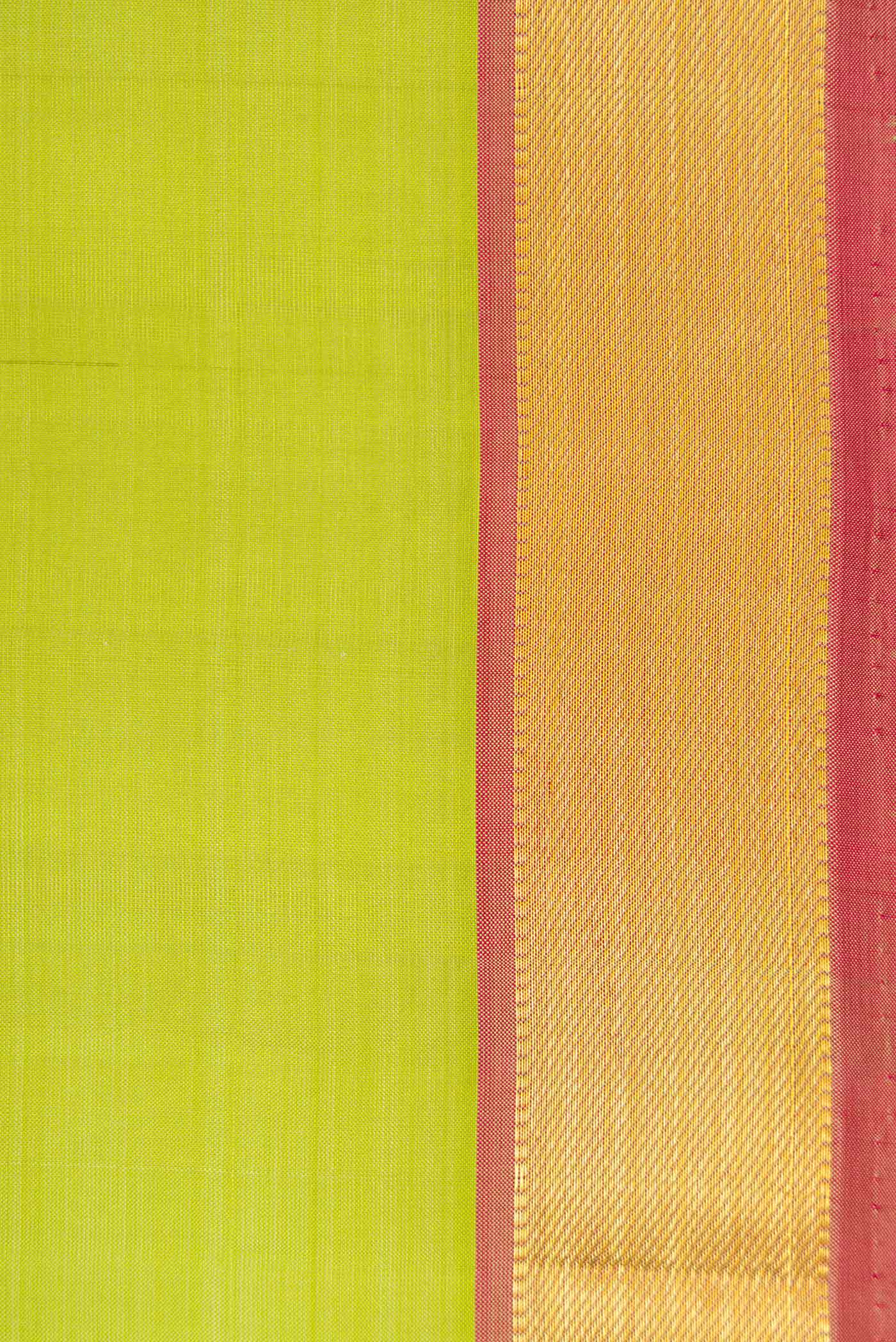 Border image of Pista Green Dual Tone Kanjivaram Silk Saree with Plain Body and Zari Border. 