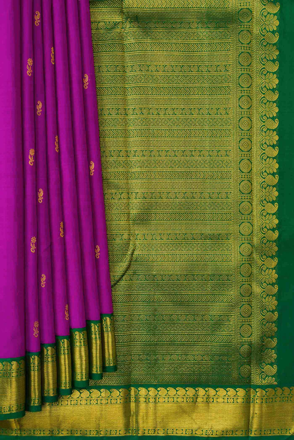 Pleats and pallu of Magenta Dual Tone Kanjivaram Silk Saree with Zari Butta on the body and Zari Border. 