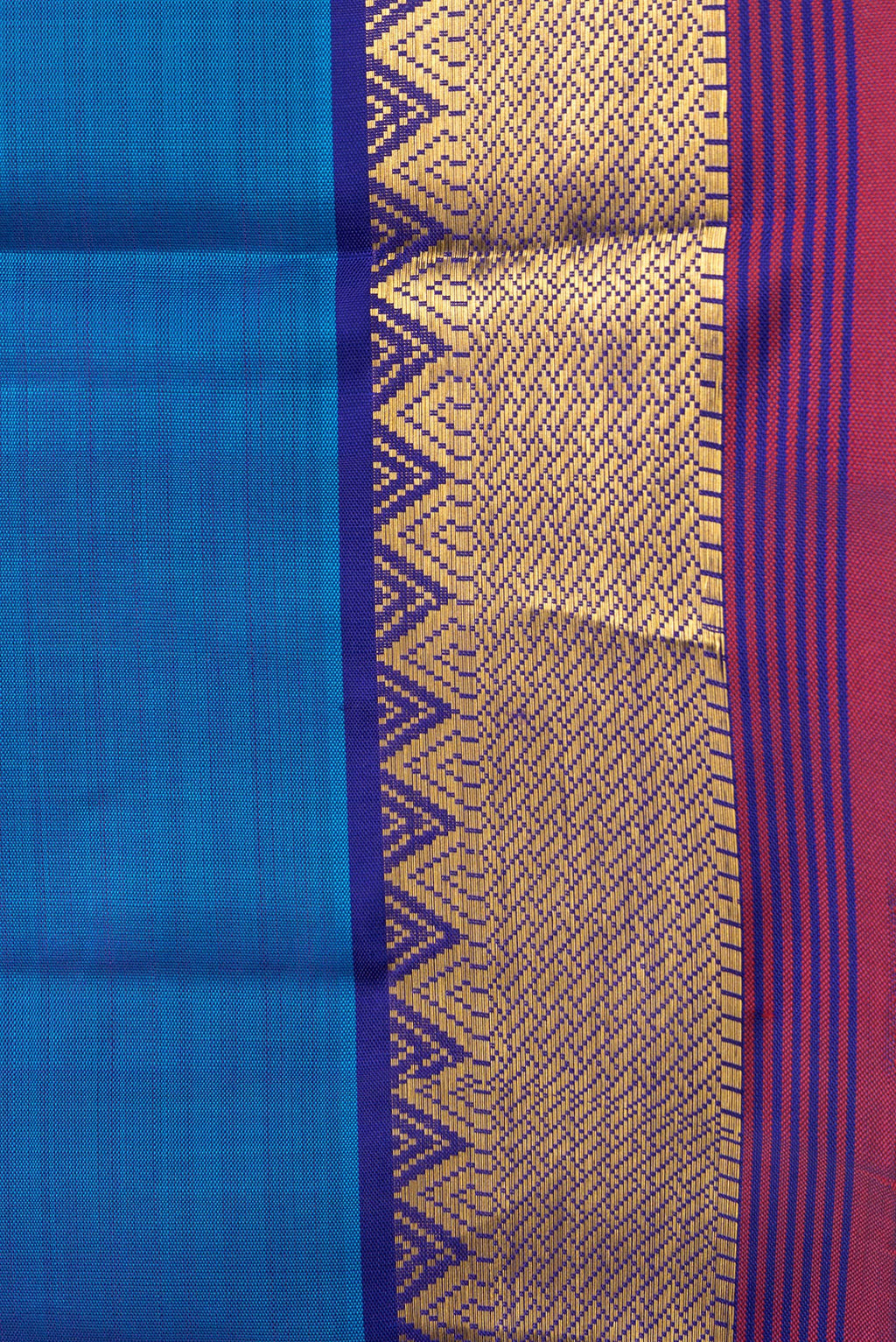 Border image of Peacock Blue Dual Tone Kanchipuram Silk Saree with Zari Butta on the body and Zari Border. 