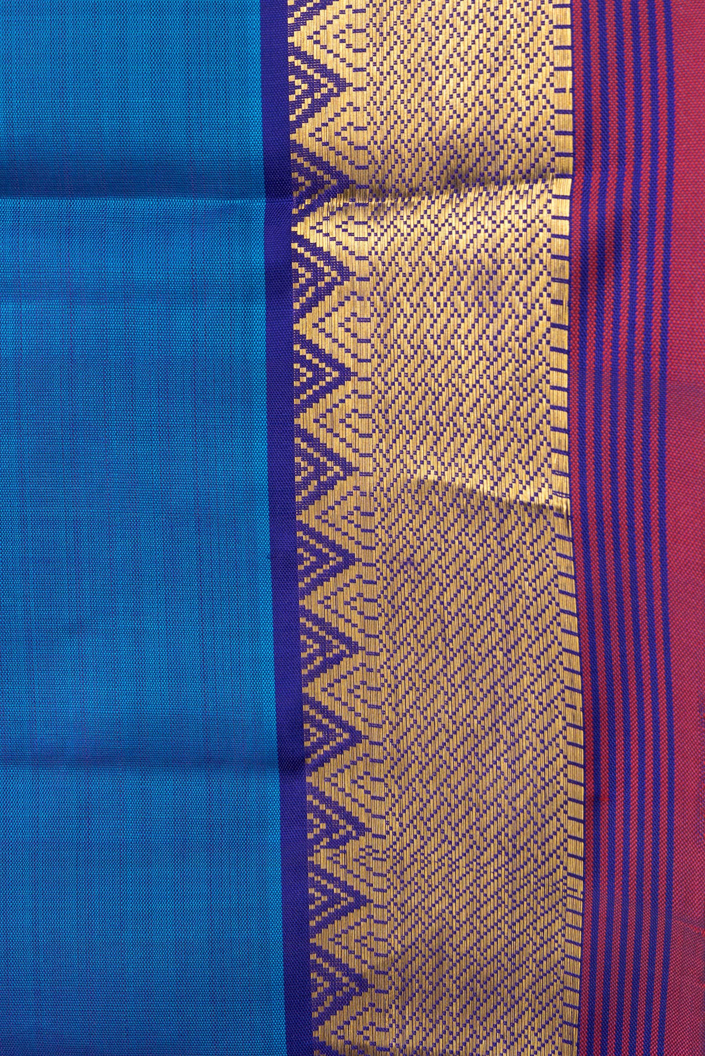 Border image of Peacock Blue Dual Tone Kanchipuram Silk Saree with Zari Butta on the body and Zari Border. 
